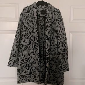 Women's knit collarless winter jacket. Brand new. Never worn. Size XL.